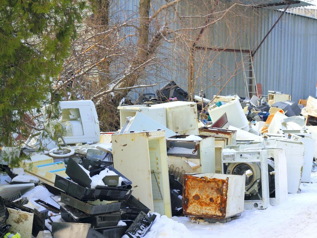 appliance on a dumpster