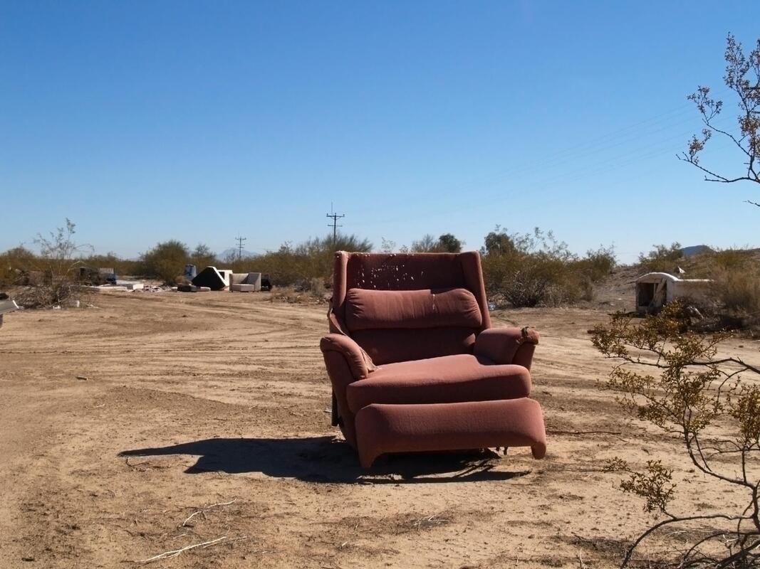 a sofa in a middle of nowhere